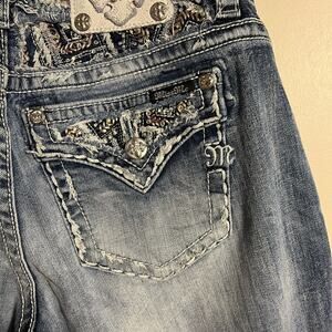 Miss Me Jeans - 29 Waist, 41 length, faded look embellished back pockets & waist